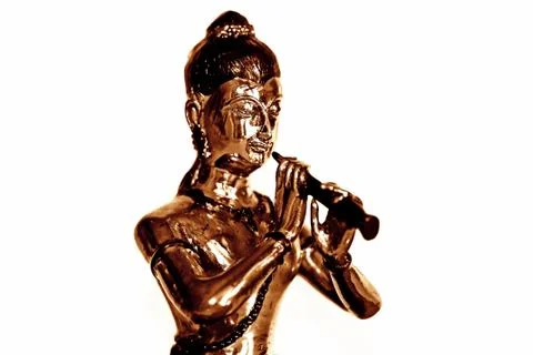 Bronze flute player Stock Photos