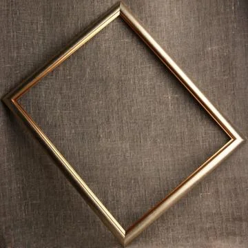 Bronze frame on grunge textile background Stock Photos