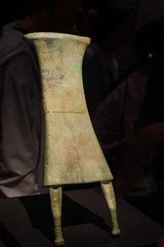A bronze human statue missing head in Sanxingdui museum. Stock Photos