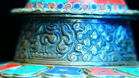 Bronze Indian pitcher richly decorated with ornaments and red and blue tiles   Stock Footage 121591374
