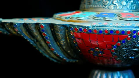 Bronze Indian pitcher richly decorated with ornaments and red and blue tiles   Stock Footage 121592524