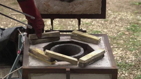 Bronze ingots in the melting pot Stock Footage 256037974