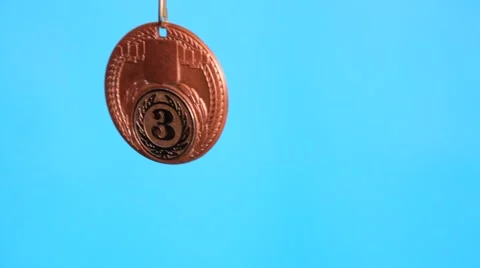 Bronze medal rotates quickly Stock-Footage 60384351