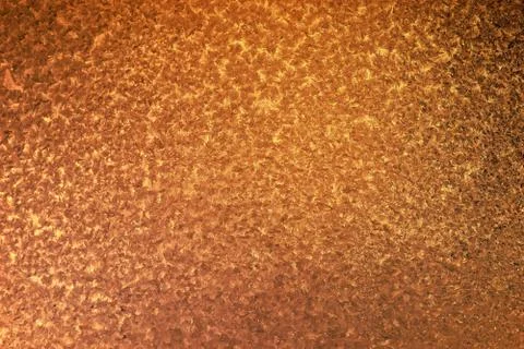 Bronze non-uniform background. Patterned metal texture industrial subjects Foto stock