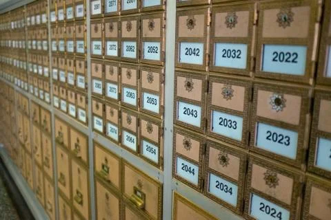 Bronze post office boxes with numbers Foto stock