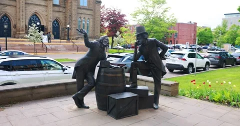 Bronze sculpture of two John Hamilton Grays by sculptor Nathan Scott, PEI Video stock 328786464