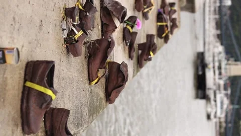 Bronze shoes, a memorial to Jews executed during the Holocaust Stock Footage 288211237