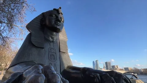 Bronze Sphinx statue at Cleopatra's Needle in London Stock Footage 241613378