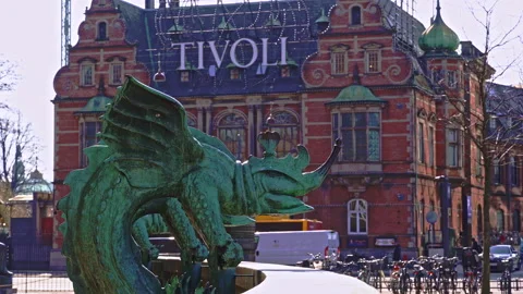 Bronze statue, in the background one of the entrances to Tivoli amusement park Stock Footage 197483013