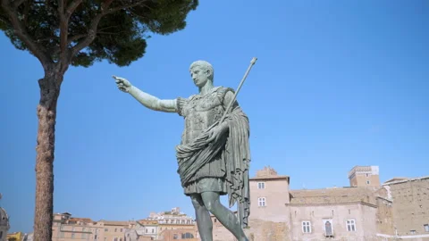 Bronze statue of Emperor Augustus located on famous street Fori Imperiali Stock Footage 146123069