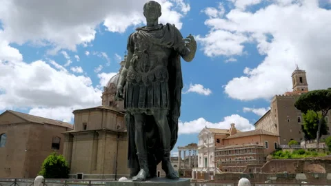 Bronze statue of emperor Julius Caesar along Via dei Fori Imperial in Rome Italy Stock Footage 155708147