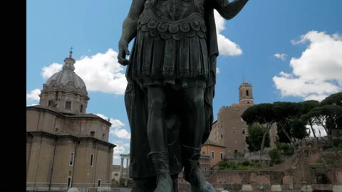 Bronze statue of emperor Julius Caesar along Via dei Fori Imperial in Rome Italy Stock Footage 156052898
