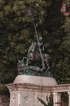 Bronze statue of a man on a horse with a spear Hungary Budapest 23.06.24 Stock Photos
