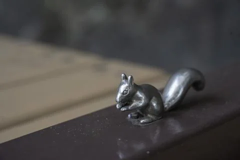 Bronze statue of a squirrel on the edge 写真素材
