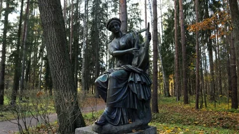Bronze statue of Terpsichore the muse of dancing in Pavlovsk landscape park Stock Footage 321187405