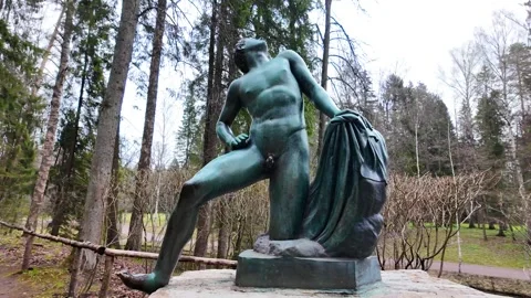 Bronze statues in the spring park. Slowmotion Stock Footage 337784376