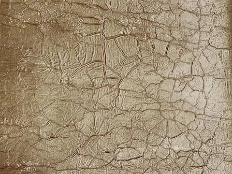 Bronze texture as background or design element, swollen old paint on the wall Stock Photos