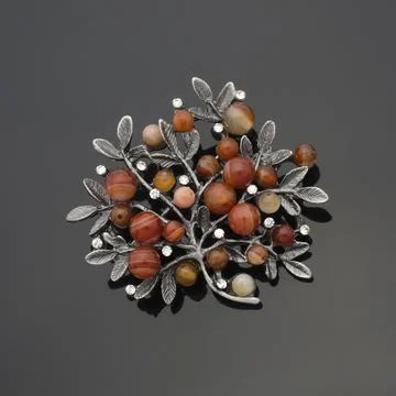 Brooch tree with gems isolated on black Stock Photos