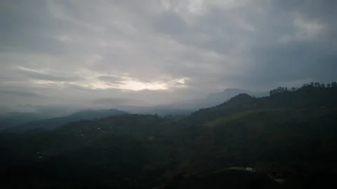 Brooding Firmament Pressing Upon Darkened Highland Silhouettes Stock Footage 316864716