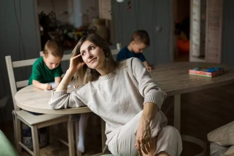 Brooding mother with children. Stock Photos