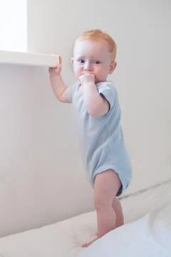 Brooding redhead boy Stock Photos