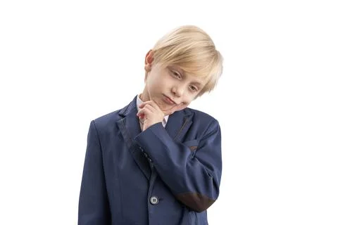 Brooding schoolboy is isolated on white background. Boy in school uniform thi Stock Photos