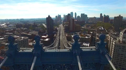 Brooklyn bridge aerial in summer, camera moving right over the bridge. Video stock 58567603
