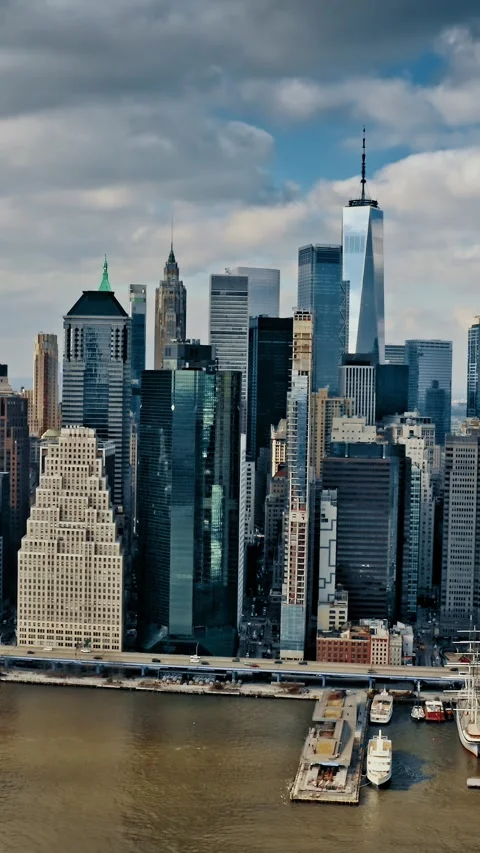 Brooklyn Bridge aerial view showcasing New York skyline and waterways Stock Footage 304280768