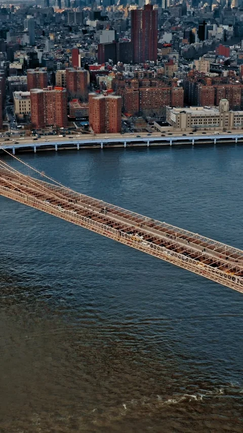 Brooklyn Bridge aerial view showcasing bustling activity in New York Stock Footage 304280922