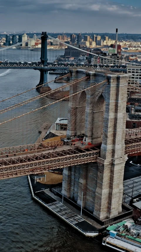 Brooklyn Bridge aerial view showcasing New York skyline and waterfront Stock Footage 304281164