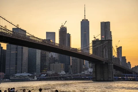 Brooklyn Bridge and Lower Manhattan Skyline at Sunset Stock-Footage 117001823