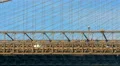 Brooklyn bridge detail side view cars and pedestrians sky New York City NYC 4k or 4k+ Resolution