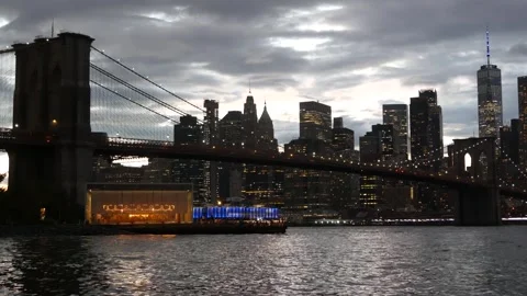 Brooklyn Bridge, Dumbo carousel. New York City Manhattan downtown skyline Stock Footage 300435847