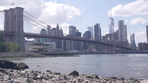 Brooklyn Bridge, Dumbo Pebble Beach. New York City Manhattan downtown skyline Stock Footage 287182743