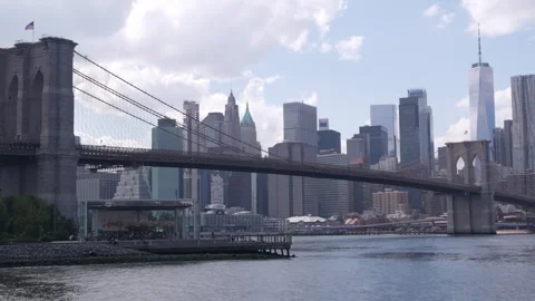 Brooklyn Bridge, Dumbo Pebble Beach. New York City Manhattan downtown skyline Stock Footage 311359738