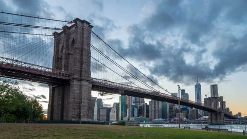 Brooklyn bridge during sunset over Manhattan with Cityscape of New York, USA. Stock Footage 143276672