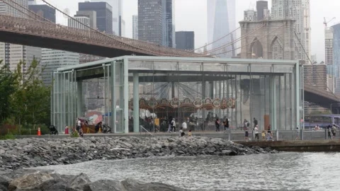 Brooklyn Bridge, Janes carousel in Brooklyn Dumbo, Manhattan view, New York Video stock 339479826