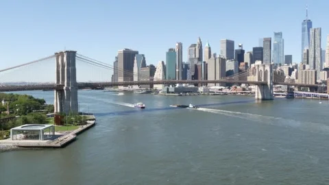 Brooklyn Bridge from Manhattan Bridge. New York City downtown skyline, financial Stock Footage 305662115
