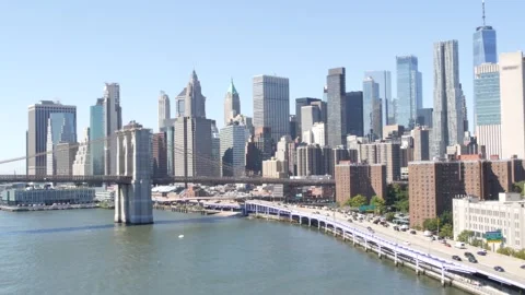 Brooklyn Bridge from Manhattan Bridge. New York City downtown skyline, financial Stock Footage 310528941