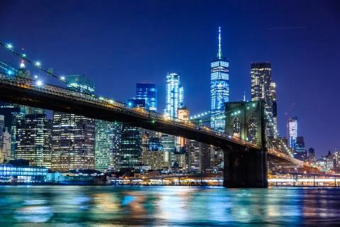 Brooklyn Bridge at Night with Water Reflection, New York City Skyline Stock Photos