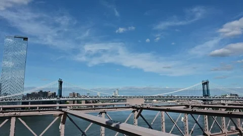 The Brooklyn Bridge is one of the most iconic architectural works of art in.. Stock Footage 310657073