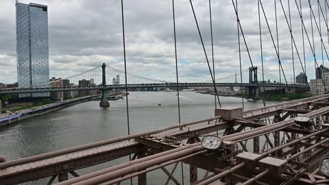 The Brooklyn Bridge is one of the most iconic architectural works of art in.. Stock Footage 310657797