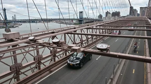 The Brooklyn Bridge is one of the most iconic architectural works of art in.. Stock Footage 310657804