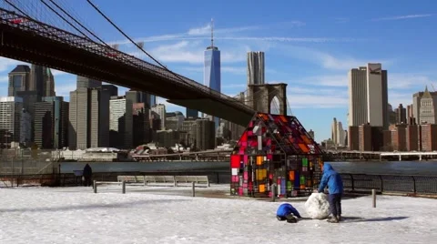 Brooklyn Bridge River Park in Winter with Children playing in snow Stock Footage 47195038