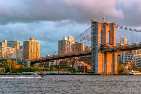Brooklyn Bridge on sunset with cloudy sky Stock Photos