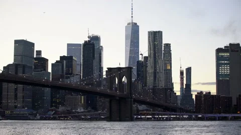 Brooklyn Bridge at Sunset, Skyscraper in the background with Freedom Tower Stock Footage 147002699