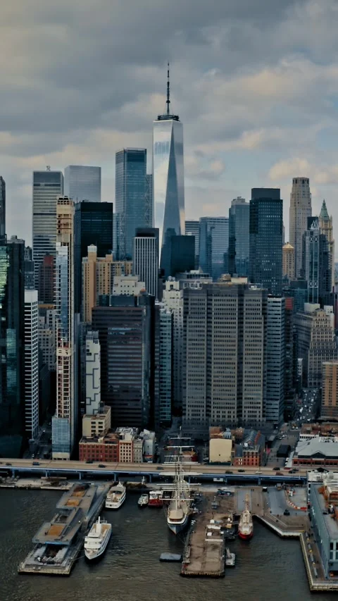 Brooklyn bridge view of New York City skyline with One World Trade Center Stock Footage 304281012