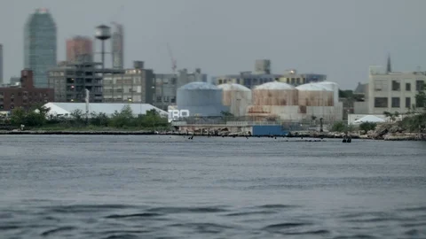 Brooklyn, industrial waterfront. Old, rusty silos. East River. Tilt-shift. Video stock 75264809
