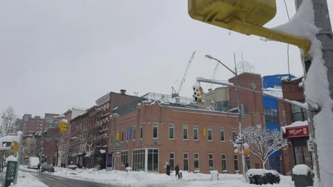 Brooklyn Intersection with Construction Cranes Under Snow, Wide Angle Stock Footage 329888759