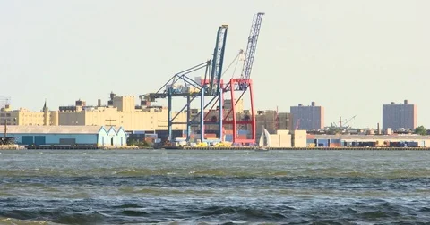 Brooklyn skyline, dock with container cranes and sail yacht Stock Footage